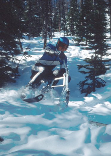 Kevan Leycraft carving through the Lynx trees. <br />Lake Louise, Alberta. April, 1989.
