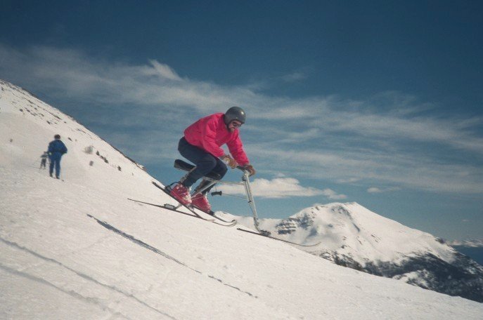 Ian Watson launching over a cat track, Lake Louise, Alberta. <br />Photo by Doug Ritchie. April, 1991.