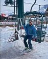 Doug Ritchie demonstrating the officially approved one-handed method <br />for getting on a chairlife. One picture is worth...well, you get it the idea. <br />It really is that easy. Lake Louise, Alberta. April, 2000.