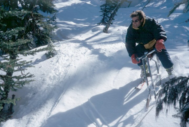 Doug Ritchie hunting for powder. Doug has been riding skibikes a long time, <br />in fact he rode the first skibike up at Lake Louise way back in 1974. <br />Lake Louise, Alberta. April, 2000.