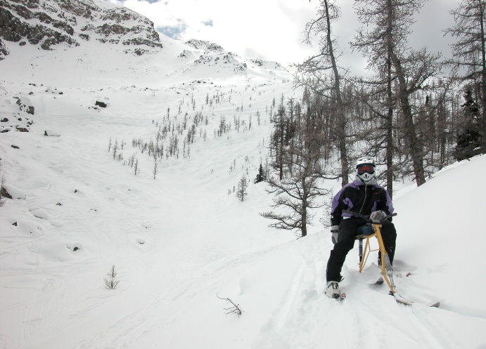 Doug Ritchie in the avalanche chute above Rock Garden. <br />Lake Louise, Alberta. April, 2003.