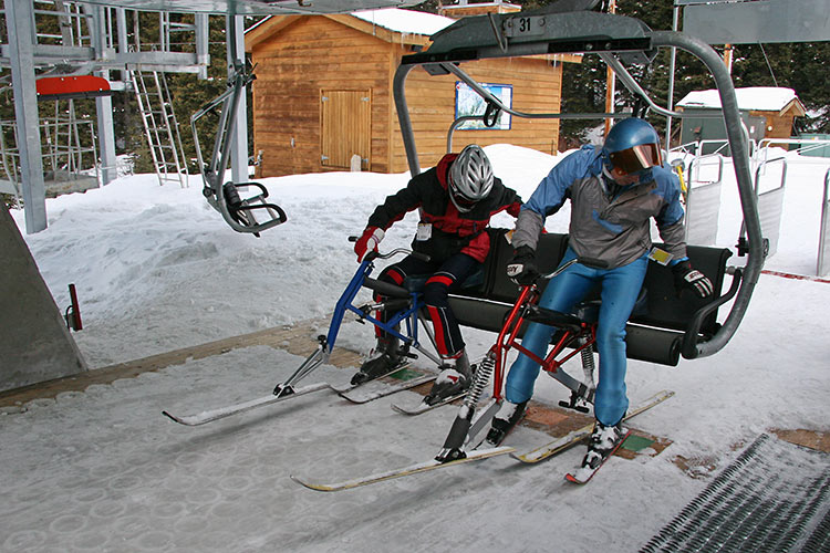 after gently lifting the skibike onto the chair, the skibike <br />seat is placed up against the backrest...