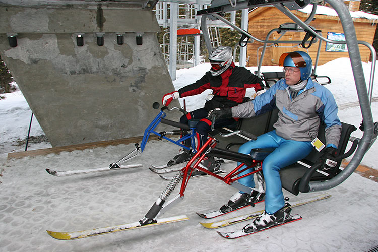 and the riders sit down naturally, while holding onto <br />the chair until the ramp is cleared.